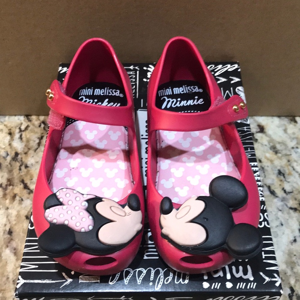 Pair of Girl Mini Melissa Minnie and Mickey shoes